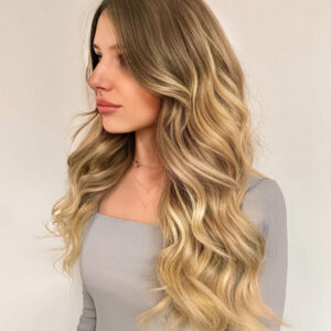 Clip-in hair extensions teddy blonde balayage
